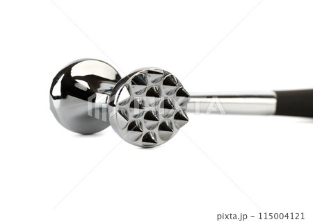Close-up of a chrome-plated meat tenderizer hammer isolated on a white background. 115004121