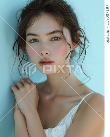 Asian woman skin care model on blue background. 115007197