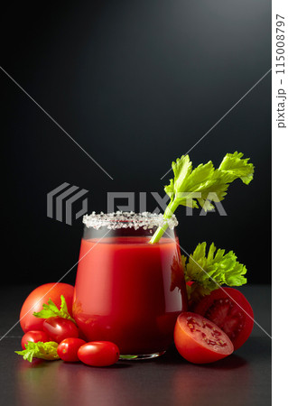 Fresh tomato juice or cocktail Bloody Mary with celery. Fresh tomato juice or cocktail Bloody Mary with celery. 115008797