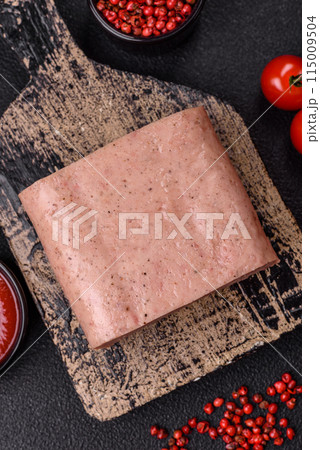 Delicious canned pink ham with salt, spices and herbs Delicious canned pink ham with salt, spices and herbs 115009504