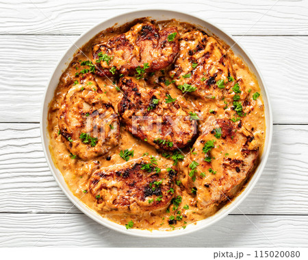 creamy smothered pork chops cooked in onion gravy creamy smothered pork chops cooked in onion gravy 115020080