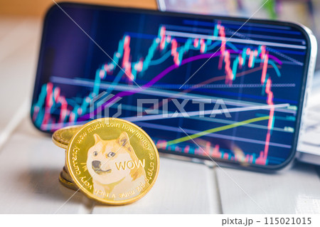 Dogecoin gold coin. Cryptocurrency and business chart in cellphone. Dogecoin gold coin. Cryptocurrency and business chart in cellphone. 115021015