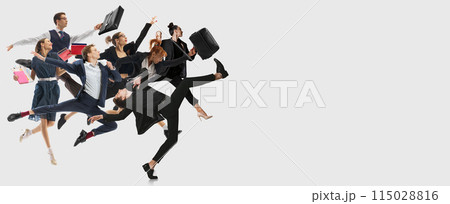 Focused employees, men and women in motion, running forward to professional success and growth isolated on white background. 115028816