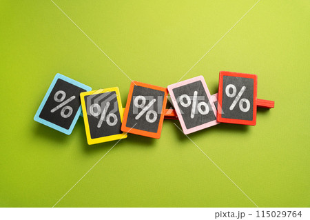 Discounts and shopping. Percentages on signs. Promotions and discounts on products. Discounts and shopping. Percentages on signs. Promotions and discounts on products. 115029764
