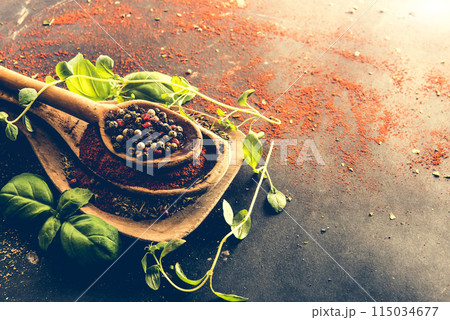 wooden spoons with spices and herbs 115034677