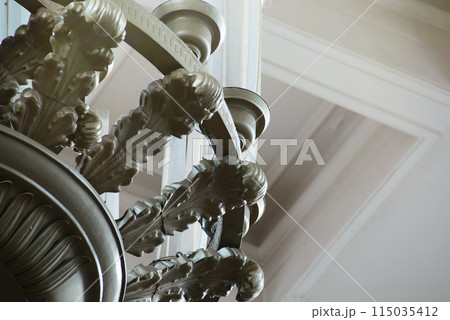 Ornate Chandelier with Intricate Metalwork 115035412