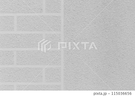 Grey rough wall brick abstract pattern white plaster texture background design facade exterior 115036656