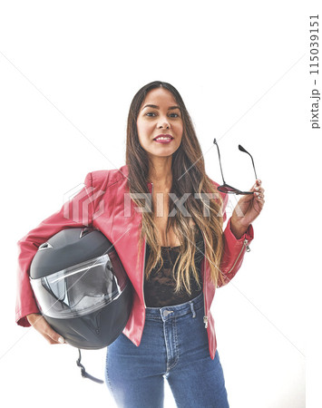 Beautiful empowered motorcyclist woman with modern look. Power woman concept 115039151