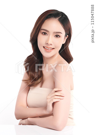 Beautiful young asian woman with clean fresh skin on white background, Face care, Facial treatment, Cosmetology, beauty and spa, Asian women portrait. Beautiful young asian woman with clean fresh skin on white background, Face care, Facial treatment, Cosmetology, beauty and spa, Asian women portrait. 115047888