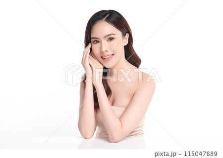 Beautiful young asian woman with clean fresh skin on white background, Face care, Facial treatment, Cosmetology, beauty and spa, Asian women portrait. Beautiful young asian woman with clean fresh skin on white background, Face care, Facial treatment, Cosmetology, beauty and spa, Asian women portrait. 115047889