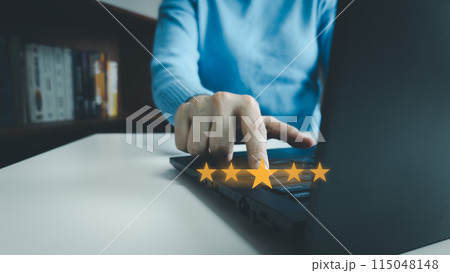 Satisfaction concept of customer, using laptop to express their opinions, answers and satisfied scores, client is satisfied with pressing 5 stars icon, excellent service, good feedback from user Satisfaction concept of customer, using laptop to express their opinions, answers and satisfied scores, client is satisfied with pressing 5 stars icon, excellent service, good feedback from user 115048148