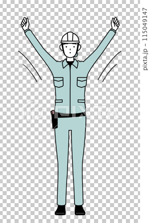 A female engineer in a helmet and work clothes doing radio exercises 115049147