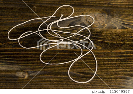 thin cotton thread for use in cooking 115049597