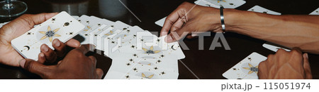Web banner with hands of people doing tarot spread Web banner with hands of people doing tarot spread 115051974