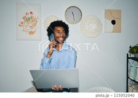 Black Entrepreneur Talking on Phone Black Entrepreneur Talking on Phone 115052040