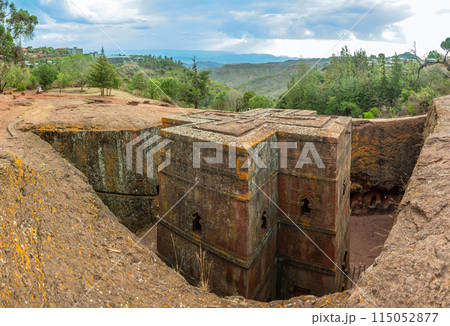 Rock hewn monolithic ortodox church of Saint George with cross roof shape, Lalibela, Amhara Region, Ethiopia. Rock hewn monolithic ortodox church of Saint George with cross roof shape, Lalibela, Amhara Region, Ethiopia. 115052877