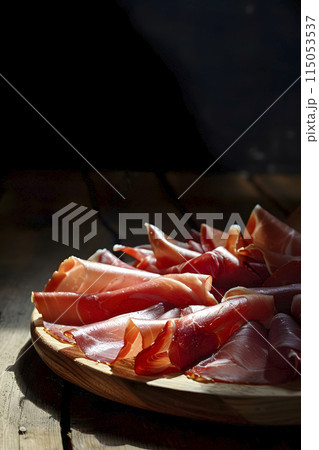 spanish serrano ham in a plate, generative AI 115053537