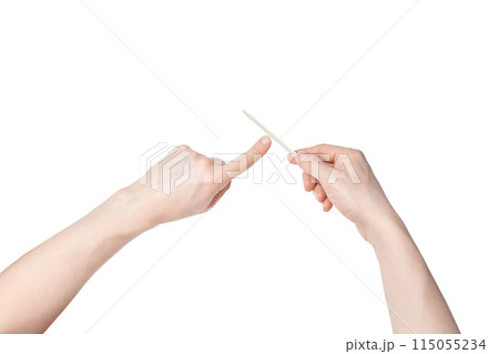 Man do manicure at home. Nail file. Self hand routine. Male finger procedure 115055234