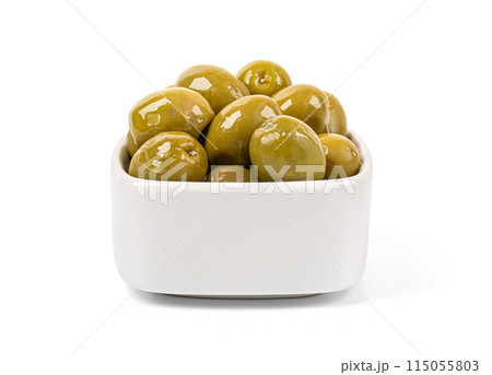 Green olives, in a white bowl Green olives, in a white bowl 115055803