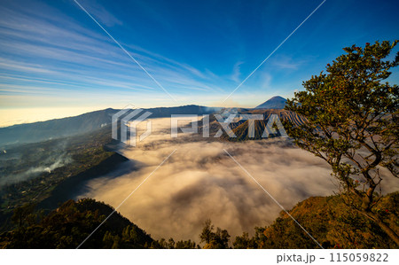 Aerial view Mountains at Bromo volcano during sunrise sky,Beautiful Mountains Penanjakan in Bromo Tengger Semeru National Park,East Java,Indonesia.Nature landscape background 115059822