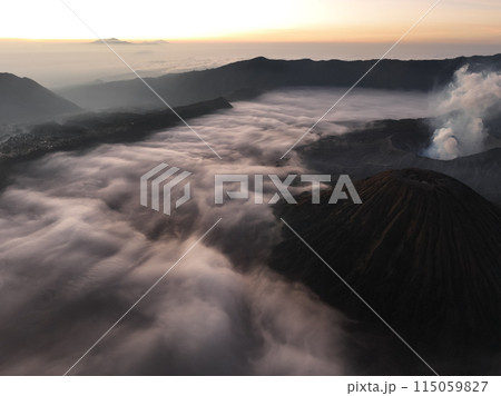 Aerial view Mountains at Bromo volcano during sunrise sky,Beautiful Mountains Penanjakan in Bromo Tengger Semeru National Park,East Java,Indonesia.Nature landscape background 115059827