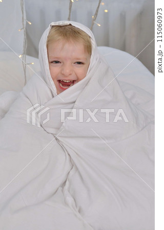 A large family with children posing in pajamas in New Year's locations. 115060973