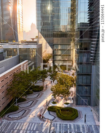 Sunset over urban small park inAl Maryah Island, in Abu Dhabi UAE Sunset over urban small park inAl Maryah Island, in Abu Dhabi UAE 115064441