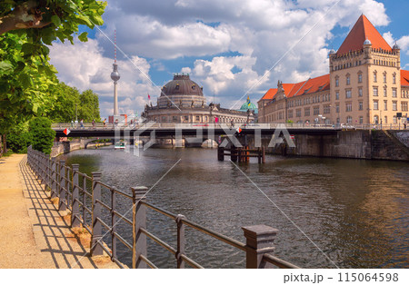 Embankment of the Spree River in the historical part of Berlin on a sunny day. Germany. Embankment of the Spree River in the historical part of Berlin on a sunny day. Germany. 115064598