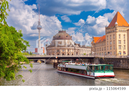 Embankment of the Spree River in the historical part of Berlin on a sunny day. Germany. Embankment of the Spree River in the historical part of Berlin on a sunny day. Germany. 115064599
