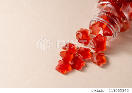 Fruit jelly gummy vitamins in a jar, food supplement. 115065546