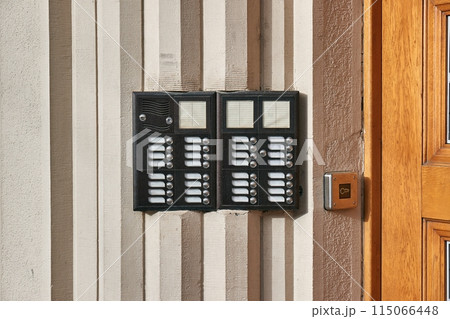 Intercom on a block of flats entrance door 115066448