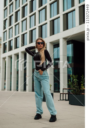 Young stylish woman in jeans in the city. City Life, Shopping 115072449