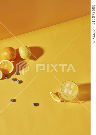 Colorful color background. Refreshing and fresh oranges, lemons and other fruits full of vitamins. 115072609