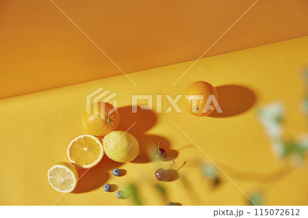 Colorful color background. Refreshing and fresh oranges, lemons and other fruits full of vitamins. Colorful color background. Refreshing and fresh oranges, lemons and other fruits full of vitamins. 115072612