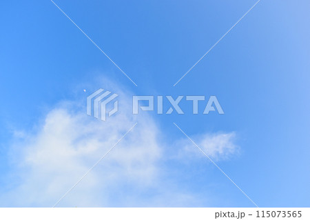beautiful blue sky and white fluffy group of clouds with sunrise in the morning, natural background beautiful blue sky and white fluffy group of clouds with sunrise in the morning, natural background 115073565