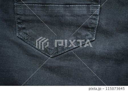 black denim clothing texture background, textile of pants fashion 115073645