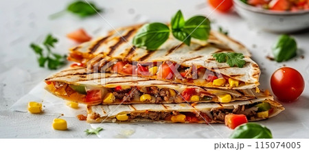 quesadillas with vegetables on grey background, side view 115074005