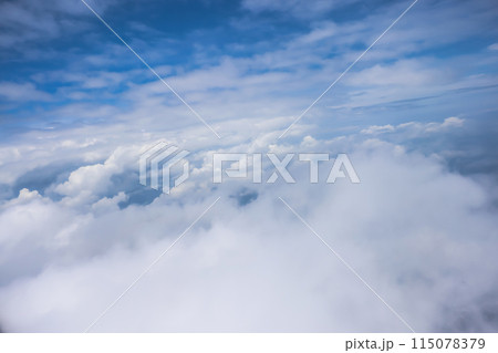 High nature view large white clouds on soft sky background High nature view large white clouds on soft sky background 115078379