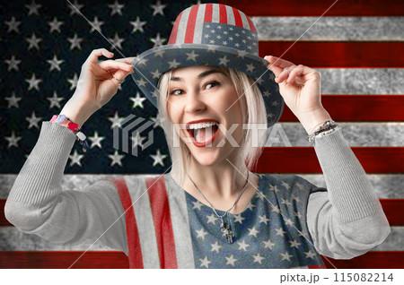 Independence Day. Happy young woman dressed in american flag clothes on american flag background Independence Day. Happy young woman dressed in american flag clothes on american flag background 115082214