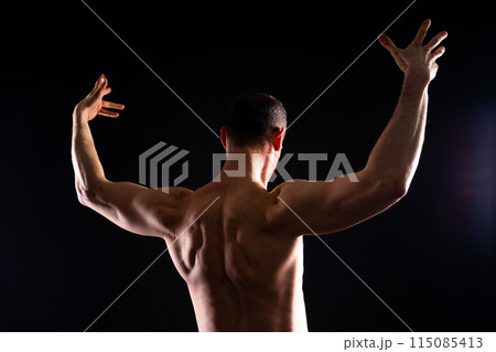 Portrait of man, bodybuilder and bicep flex in studio, background and exercise for muscular power. Portrait of man, bodybuilder and bicep flex in studio, background and exercise for muscular power. 115085413