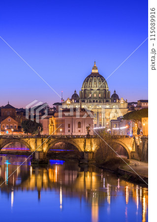 St. Peter's Basilica in Vatican City with the Tiber River passing through Rome, Italy 115089916