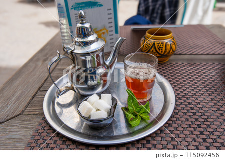 Refreshing cold Moroccan mint tea in Essaouira. Refreshing cold Moroccan mint tea in Essaouira. 115092456