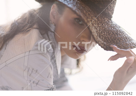 Indoor portrait of a young beautiful fashionable woman wearing stylish accessories. 115092842