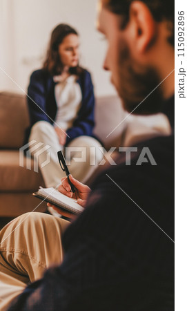 Therapist providing psychological help to female patient. Treatment of emotional and mood disorders 115092896