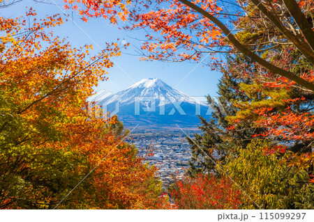 Mount Fuji framed with red orange maple leaves beautifully in autumn. Mount Fuji framed with red orange maple leaves beautifully in autumn. 115099297