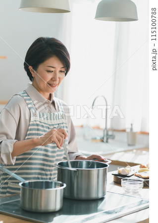 a forty-something woman a forty-something woman 115100788