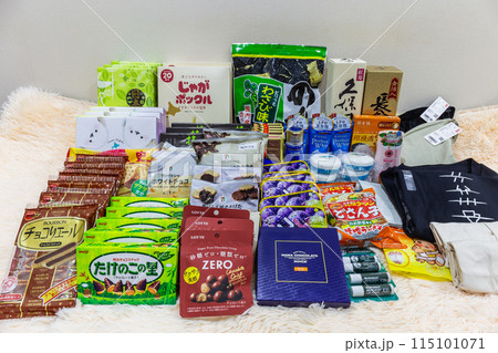 Mix collection of snacks, food, souvenirs, supplements, beverages clothing and liquor that are popular in Japan for foreign tourists use for background. 115101071