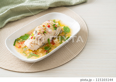 steamed sea bass fish with herbs 115103144