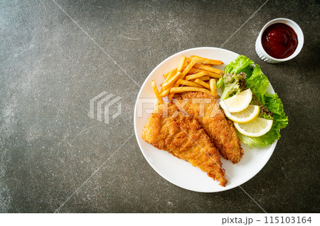 Homemade Breaded Weiner Schnitzel with Potato Chips 115103164