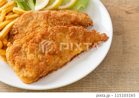 Homemade Breaded Weiner Schnitzel with Potato Chips Homemade Breaded Weiner Schnitzel with Potato Chips 115103165